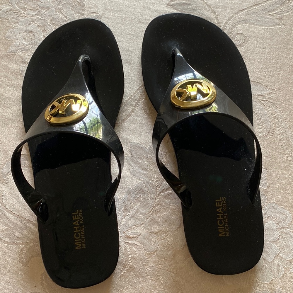 Michael Kors flip flop style sandals